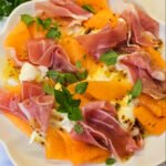 Melon salad on a white plate
