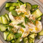 Zucchini salad on a grey plate.