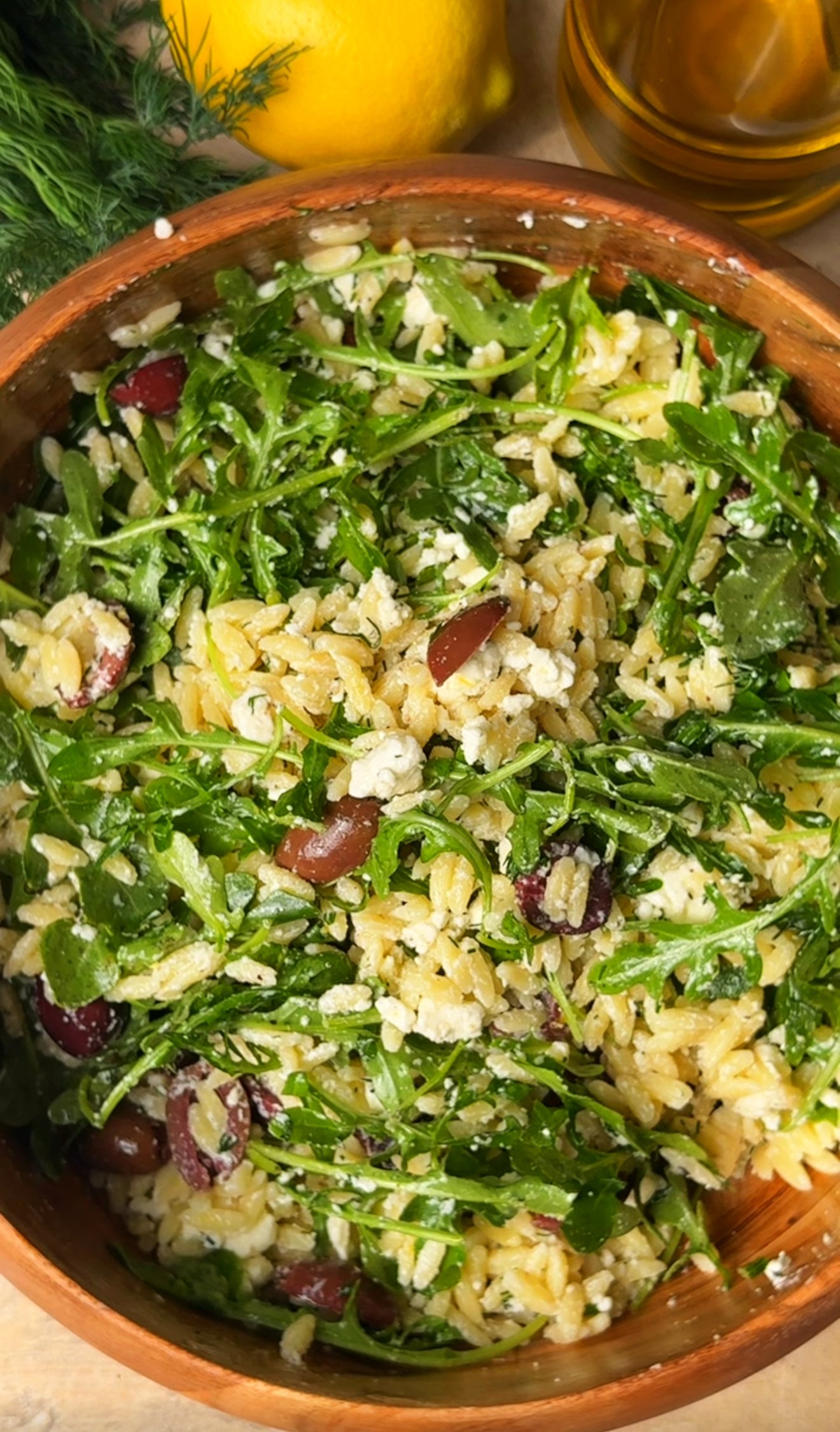 Lemon-Dill Orzo Salad in a wooden bowl