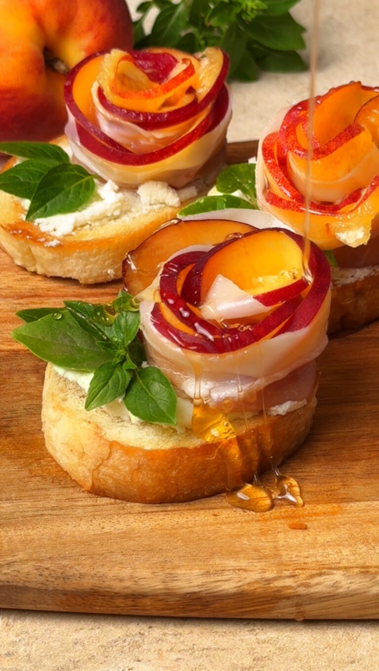 Peach and Prosciutto Crostini on a wooden board