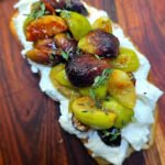 Toast with Caramelized Figs on wooden board