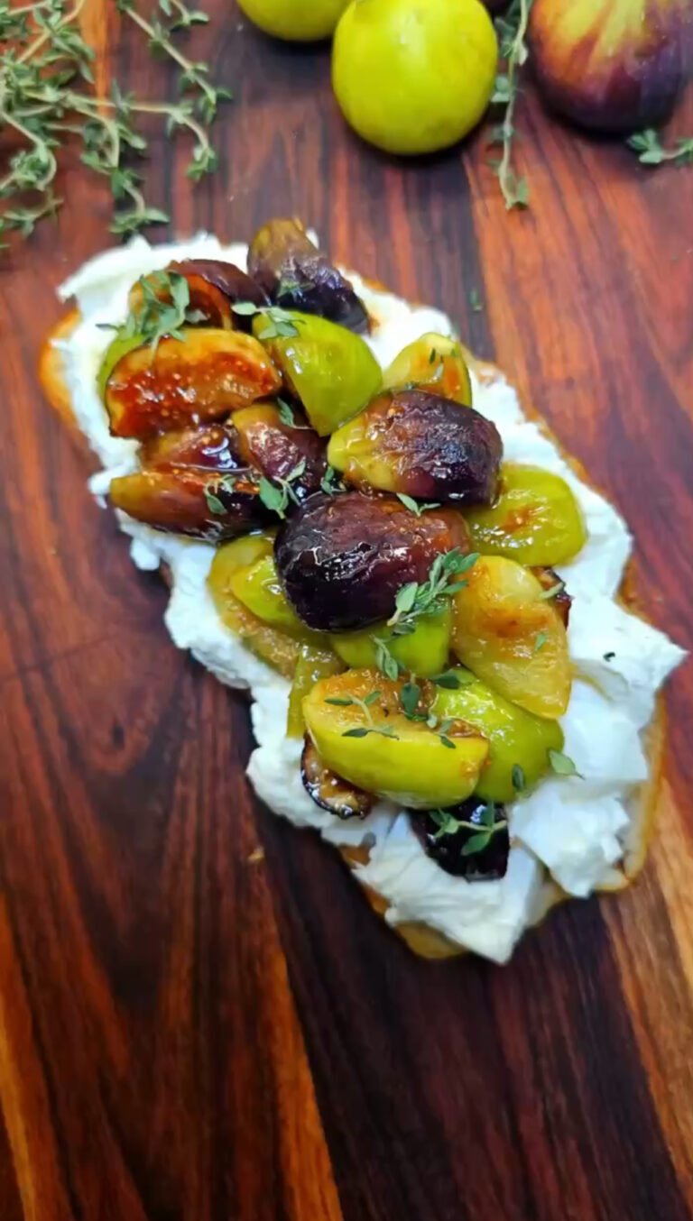 Toast with Caramelized Figs on wooden board