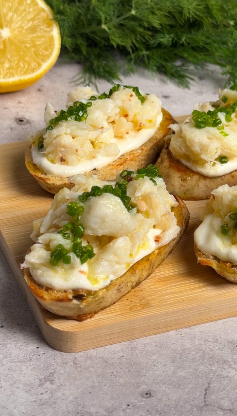 Easy crab crostini appetizer made with canned crab and lemon ricotta