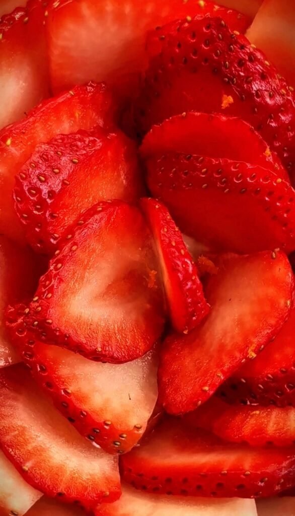 Thinly sliced fresh strawberries layered for a strawberry mascarpone parfait