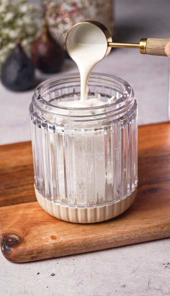 Heavy cream poured over goat cheese before whipping until smooth and fluffy