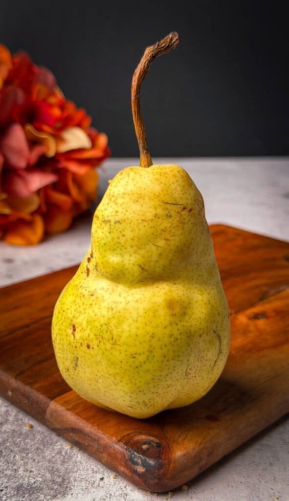 Fresh D'Anjou pear used in pear cheesecake with prosciutto